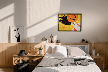 Bright mosaic hanging over bed in cozy bedroom