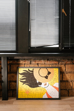 Bright mosaic placed under window
