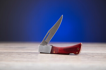 small knife in dark background