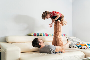 Father playing with his son.