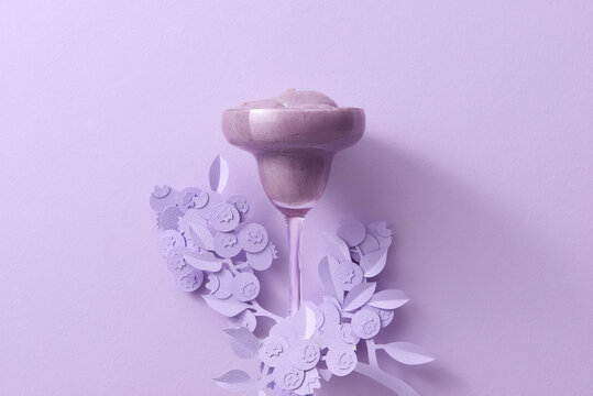 healthy blueberry smoothie on purple background