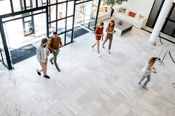 Group of Coworkers Chatting in Office