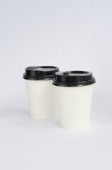 photo white cup plain on white background , mock up glass plastic