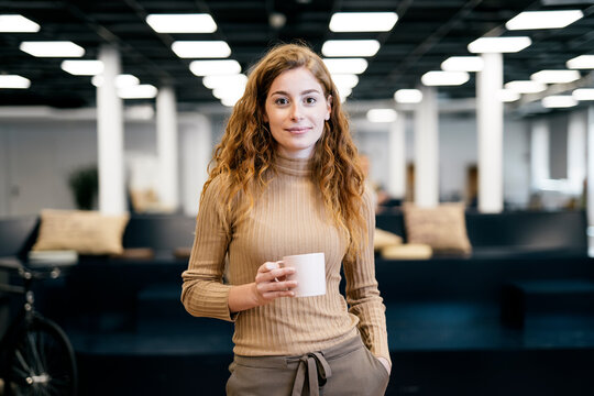 Portrait of Business Woman Looking at Camera
