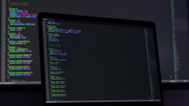 Real CSS code. Front end web development. CSS code on laptop screen. Web design concept.