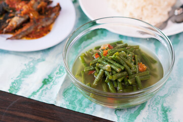 Healthy and delicious Indonesian long beans soup on the table