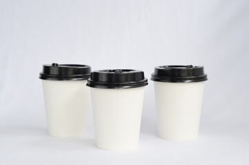 photo white cup plain on white background , mock up glass plastic