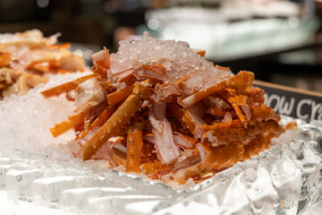 Luxury seafood buffet on ice with prawns, king crabs, snow crabs,  shrimps