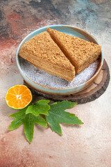 front view yummy honey cake on a light background cake sweet sugar biscuit