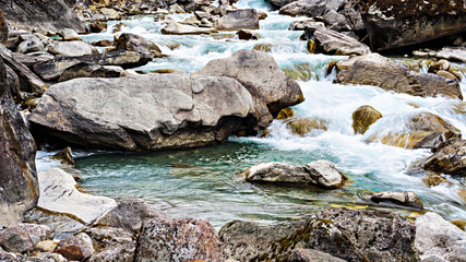 Himalayan mountains river crossing on the trek from Chatra Kola to Khotey it is on trekking route to Mera peak in Nepal.