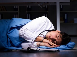 Doctor working night shift in hospital after long hours