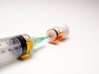 Close up shoot of vaccine on a bottle, capture on white isolated background