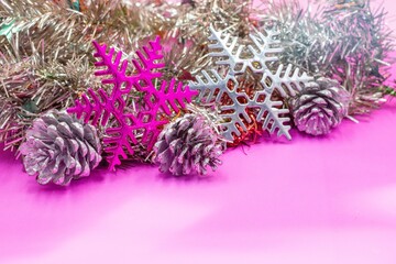 Fototapeta na wymiar Christmas decoration in pink and purple theme with snowflake