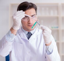 Expert criminologist working in the lab for evidence