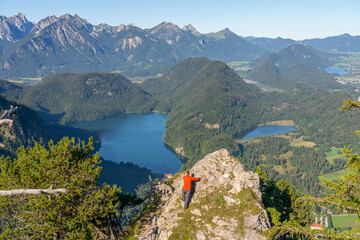 Tourist overlooking beautiful landscape of Schwangau. Southwest Bavaria. Germany 