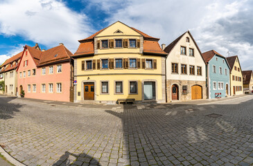 Spitalgasse street panorama. Streets in Rothenburg ob der Tauber with traditional German houses in morning light. Bavaria, Germany