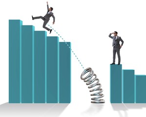 Business people jumping over bar charts