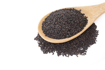 Closeup black sesame seeds on wood spoon with white background, healthy food concept