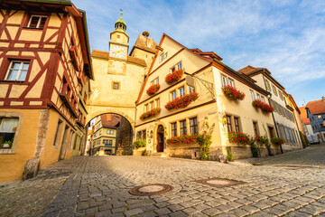 Fototapeta na wymiar Markus tower in morning light. One of the oldest ruins of this Bavarian town of Rothenburg ob der Tauber. Germany