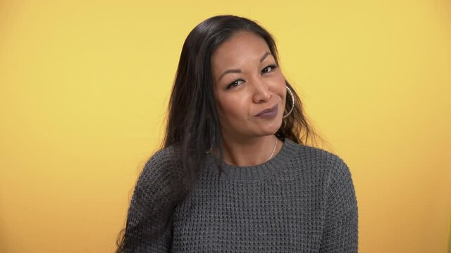 Sassy woman shakes her head no, not buying explanation of liar