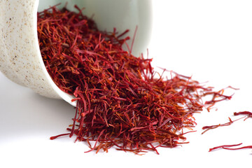 A close-up picture of saffron on a white background