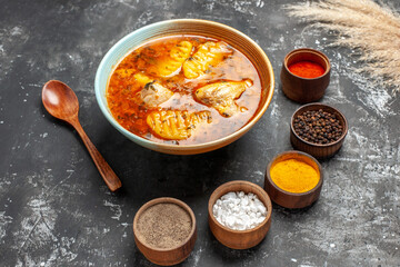 Side view of homeade chicken dish for the whole family and spices set