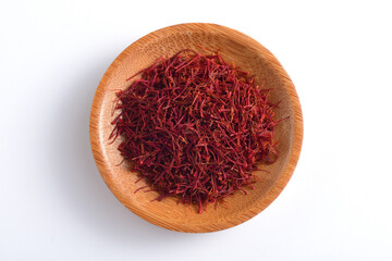 A close-up picture of saffron on a white background