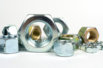 close-up of various metal nuts for fastening products