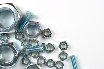 close-up of metal fasteners. bolts and nuts with free space