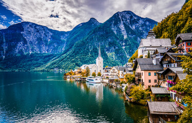 Beautiful view of famous Hallstatt mountain village in the Austrian Alps during fall season