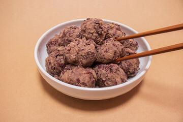 Korean traditional rice cake made from the glutinous rice and coated with mashed adzuki beans. homemade food, Injeolmi, tteok.