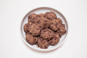 Korean traditional rice cake made from the glutinous rice and coated with mashed adzuki beans. homemade food, Injeolmi, tteok.