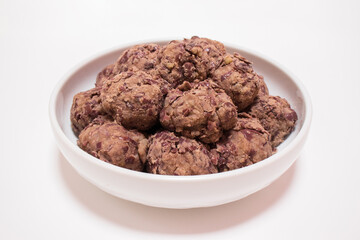 Korean traditional rice cake made from the glutinous rice and coated with mashed adzuki beans. homemade food, Injeolmi, tteok.