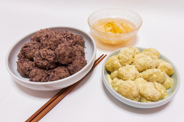 Rice cakes made with bean flour and mashed adzuki beans, Watery Kimchi (mulgimchi, mulkimchi), Korean traditional food, dessert, Injeolmi, tteok, homemade food.