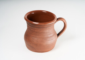 ceramic product with your own hands, made on a Potter's wheel, isolated on a white background