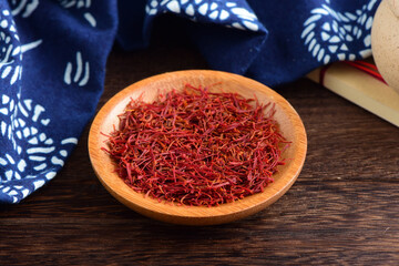 Close-up pictures of traditional Chinese medicine saffron on the background of retro Chinese style