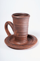 ceramic product with your own hands, made on a Potter's wheel, isolated on a white background