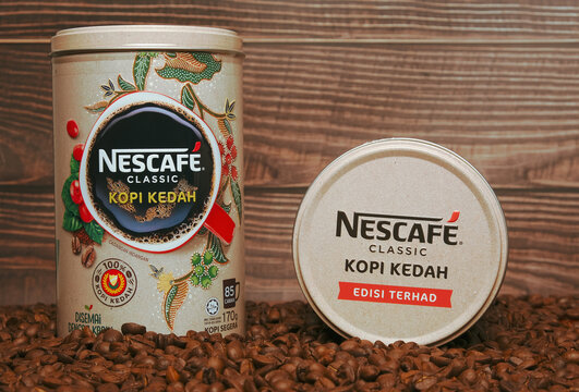 Alor Setar, Malaysia- Circa December, 2020:  Limited Edition Nescafe Classic Kopi Kedah Canisters On Coffee Bean And Wooden Wall Insight. This Edition Help To Boost Local Coffee Industry In Kedah.