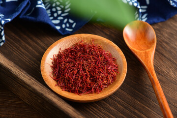 Close-up pictures of traditional Chinese medicine saffron on the background of retro Chinese style