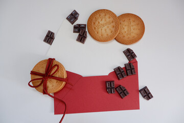  Valentine’s Day concept.A Greeting card set decoration with cookies, chocolates and red ribbon on white  background. Valentine’s Day background. バレンタインデーデコレーション