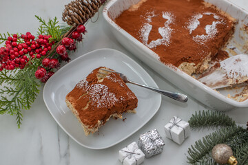 sweet home made christmas tiramisu on a festive table