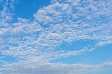 Beautiful mackerel sky with many small white clouds