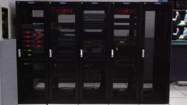 TV station media racks for broadcasting live shows. Digital signal processing and multiplexing for airwave transmission and synchronization of television programs. 
