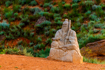Chinese statue of Confucius or old asian sage on a ground