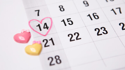 Selected focus love symbol heart shape greeting event holiday, bright white calendar 14 February. Concept for lover Valentine's Day inscription numbers. Pink circle reminder
