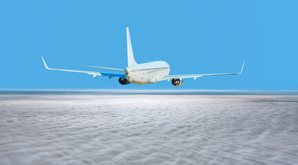 White passenger airplane over the clouds  - Travel by air transport