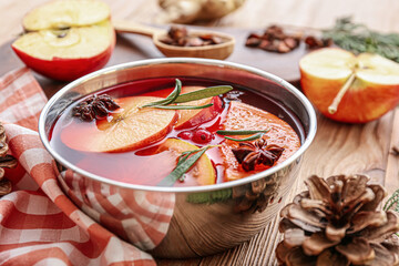 Bowl of hot mulled wine on table