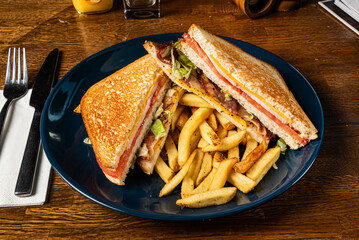 club sandwich and french fries