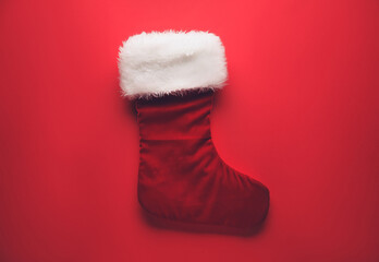 Christmas sock on color background