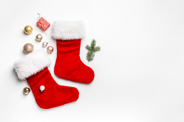 Composition with Christmas socks on white background